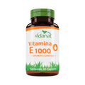 Frasco ámbar de 30 cápsulas de Vitamina E1000 Vidanat con tapa verde y etiqueta naranja, sobre fondo blanco